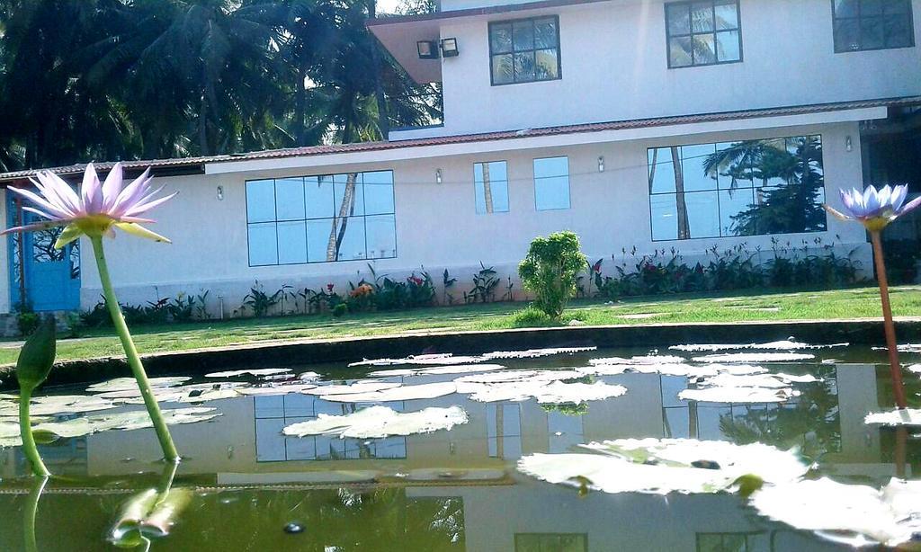 Nisarga Nirvana River House มังคาลอร์ ภายนอก รูปภาพ